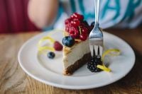 Kaboompics - Berry Cheesecake Slice on Plate with Raspberries and Blueberries
