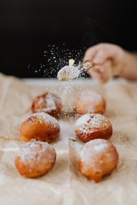 Kaboompics - Powdered Sugar Falling over Polish Paczki, Shallow-Focus Dessert Photography