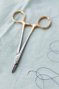 Kaboompics - Vertical View of Needle Holder and Black Suture