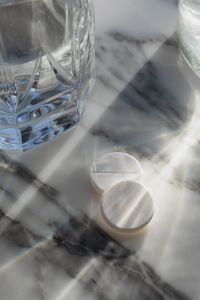 Kaboompics - White Tablets Beside Water Glasses on Marble