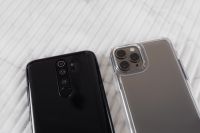 Kaboompics - Tight Crop of Black and Silver Phone Cameras on Textured Marble