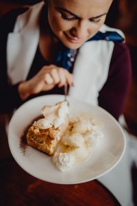Apple pie with whipped cream and ice cream in Cafe Verte