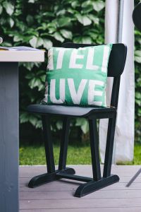 Kaboompics - Black chair with a pillow