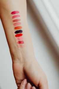 Kaboompics - Lipstick swatches on woman hand