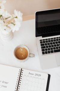 Kaboompics - White Flower Vase, Coffee and Laptop on a Marble Work Surface