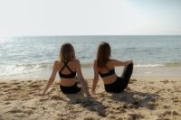 Kaboompics - Two Women Sitting Facing the Sea