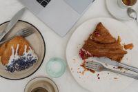 Kaboompics - Overhead Laptop, Croissants, Espresso and Water