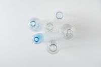 Kaboompics - Overhead View of Empty Plastic Bottles and Colored Necks