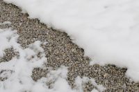 Kaboompics - Snow and Gravel Garden Path Texture in a Minimal Winter Landscape