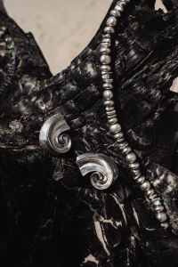 Kaboompics - Close-Up Silver Spiral Earrings and Necklace