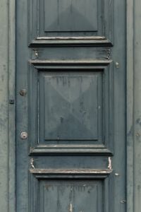 Kaboompics - Weathered Grey Green Wooden Door Panel with Peeling Paint Texture