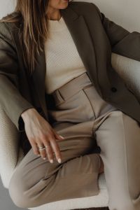 Kaboompics - Minimalist Woman Relaxing in a Neutral Armchair