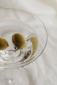 Kaboompics - Green Cocktail with Lime on a Round Table