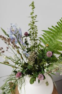 Kaboompics - Mixed Wildflower Arrangement with Pale Blue Blossoms, Ferns and Pink Clover