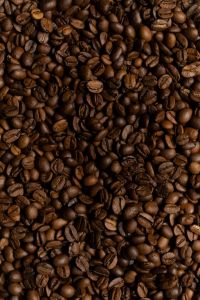 Kaboompics - Dense Dark Roasted Coffee Bean Pattern, Vertical Espresso Background Texture