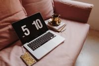 Kaboompics - Laptop, Coffee and Gold-Case Smartphone on Pink Couch