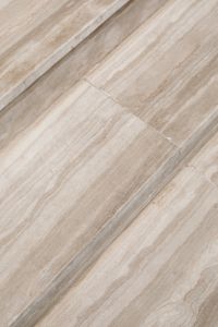 Kaboompics - Light Beige Veined Stone Surface