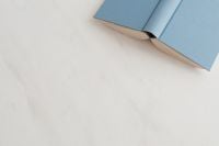 Kaboompics - Blue open book on marble table