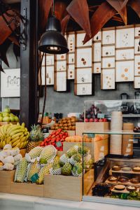 Kaboompics - Fruit Stall Beneath Pendant Lights at San Miguel Market