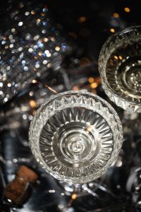 Kaboompics - Close-Up Champagne Coupe with Golden Reflections