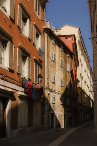 Kaboompics - Laundry Hanging Above a Narrow Italian Old Town Street