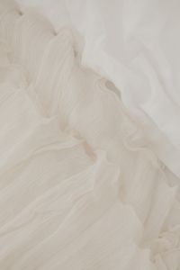 Kaboompics - White Sheer Textile With Soft Ruffled Folds