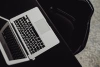 Kaboompics - Stylish workspace with MacBook computer on home or studio