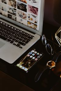Kaboompics - Laptop and Smartphone Workspace with Glasses, Watch and Gold Lamp