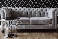 Kaboompics - Elegant grey sofa and a table