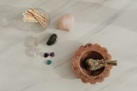 Kaboompics - Buddha Statue With Sage Bowl And Crystals