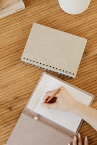 Kaboompics - Blank Kraft Notebook on Wooden Workspace