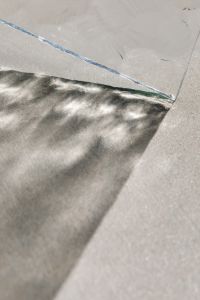 Kaboompics - Diagonal Glass Edge and Diffused Shadow on Pale Background