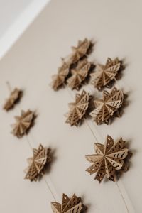 Kaboompics - Close Up of Wooden Snowflake Wall Garland