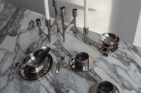 Kaboompics - Chrome Candelabra and Coffee Tableware on Arabescato Marble