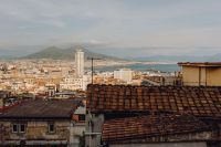 Kaboompics - Terracotta Rooftops Over Naples With Mount Vesuvius Across the Gulf