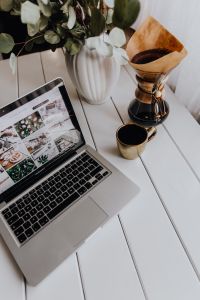 Kaboompics - Apple MacBook & Coffee on the white desk