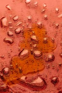 Kaboompics - Peach Skincare Liquid with Orange Bubbles