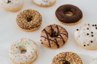 Kaboompics - Various donuts on white marble
