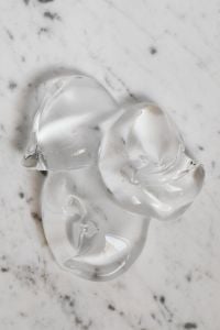 Kaboompics - Transparent Gel Swirls on Marble Background