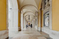 Kaboompics - Walkway beneath the Rua Augusta Arch in Lisbon, Portugal, Historic Pedestrian Arcade