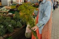Kaboompics - Woman Shopping for Kale and Fresh Herbs
