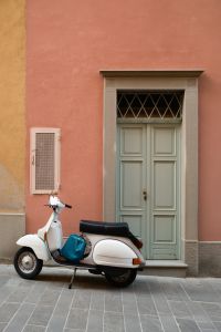 Kaboompics - Vintage White Scooter Parked by a Pink Italian House