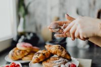 Kaboompics - Close-Up of Hands Sifting Sugar Over Puff Pastry