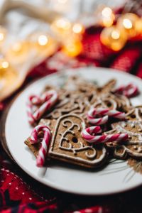 Kaboompics - Red Christmas Mug with Gingerbread Cookies and Candy Canes