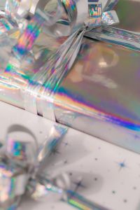Kaboompics - Holographic Gift Box and Silver Ribbon Detail
