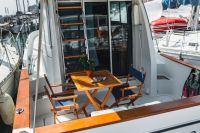 Kaboompics - Yacht Deck With Table and Folding Chairs