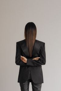 Kaboompics - Back View of Woman in Black Blazer with Crossed Arms