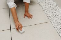 Kaboompics - Close-Up of Hand Cleaning a Tiled Floor