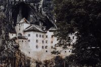 Kaboompics - Predjama castle at the cave mouth in Postojna, Slovenia