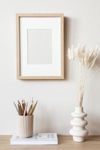 Kaboompics - Neutral Frame Mockup with Pencils, Pampas Grass and a Lit Candle